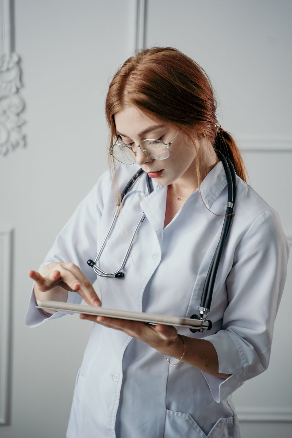 Healthcare professional reviewing digital information